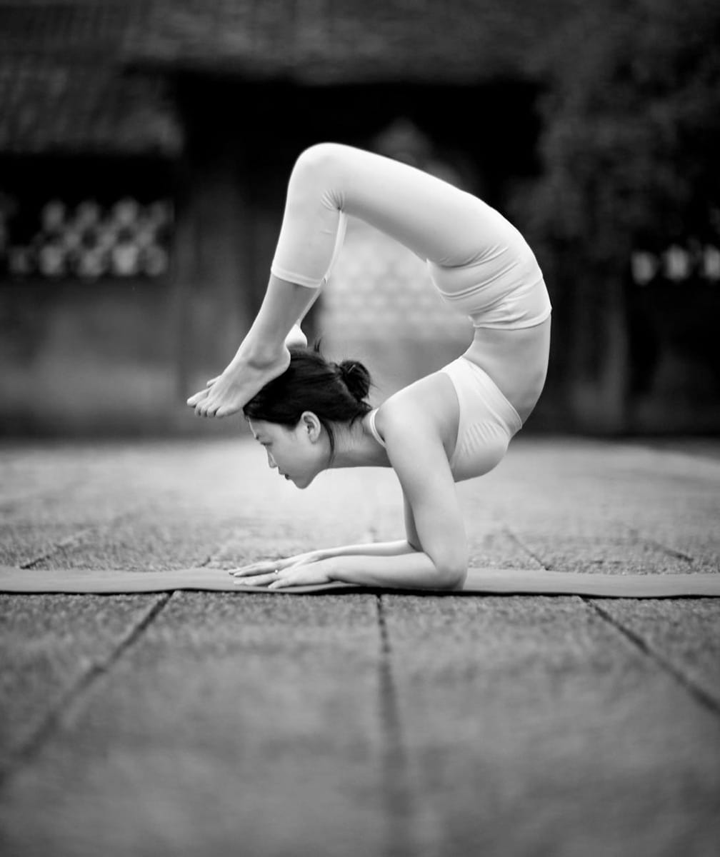 Breathe With Sandy, Demonstrating a Pranayama Pose
